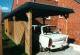 Holzcarport mit Flachdach und Seitenwand