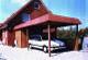Holzcarport mit Schieferblende