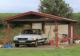 Satteldach-Carport mit  Beton-Geräteraum